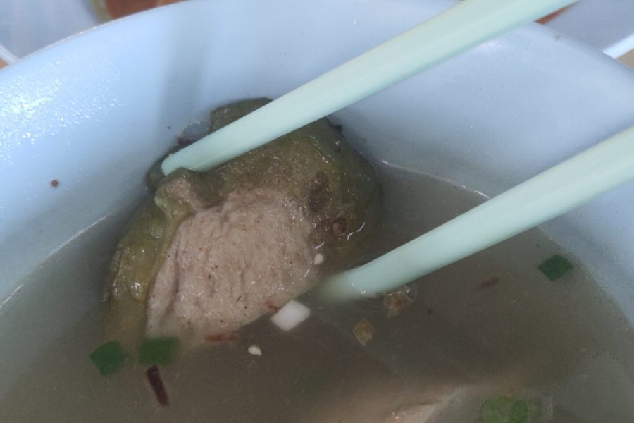 Grabbing a delicious bite of Yong Tau Foo.